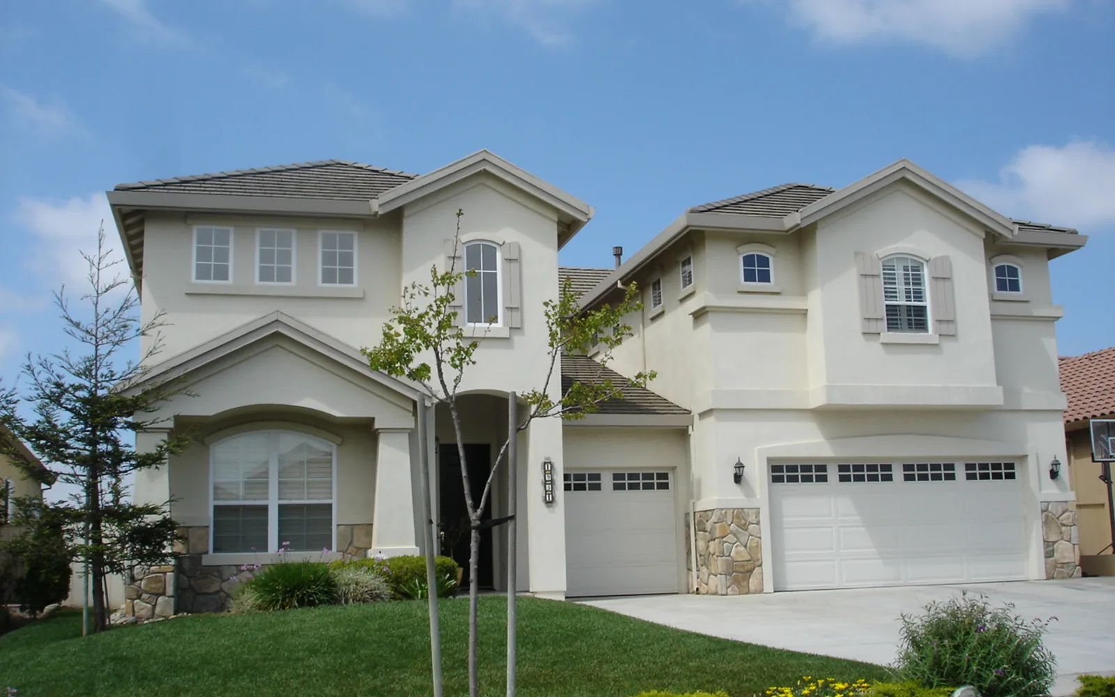 A single-family suburban home with a pitched roof and garage, typical of California residential neighborhoods